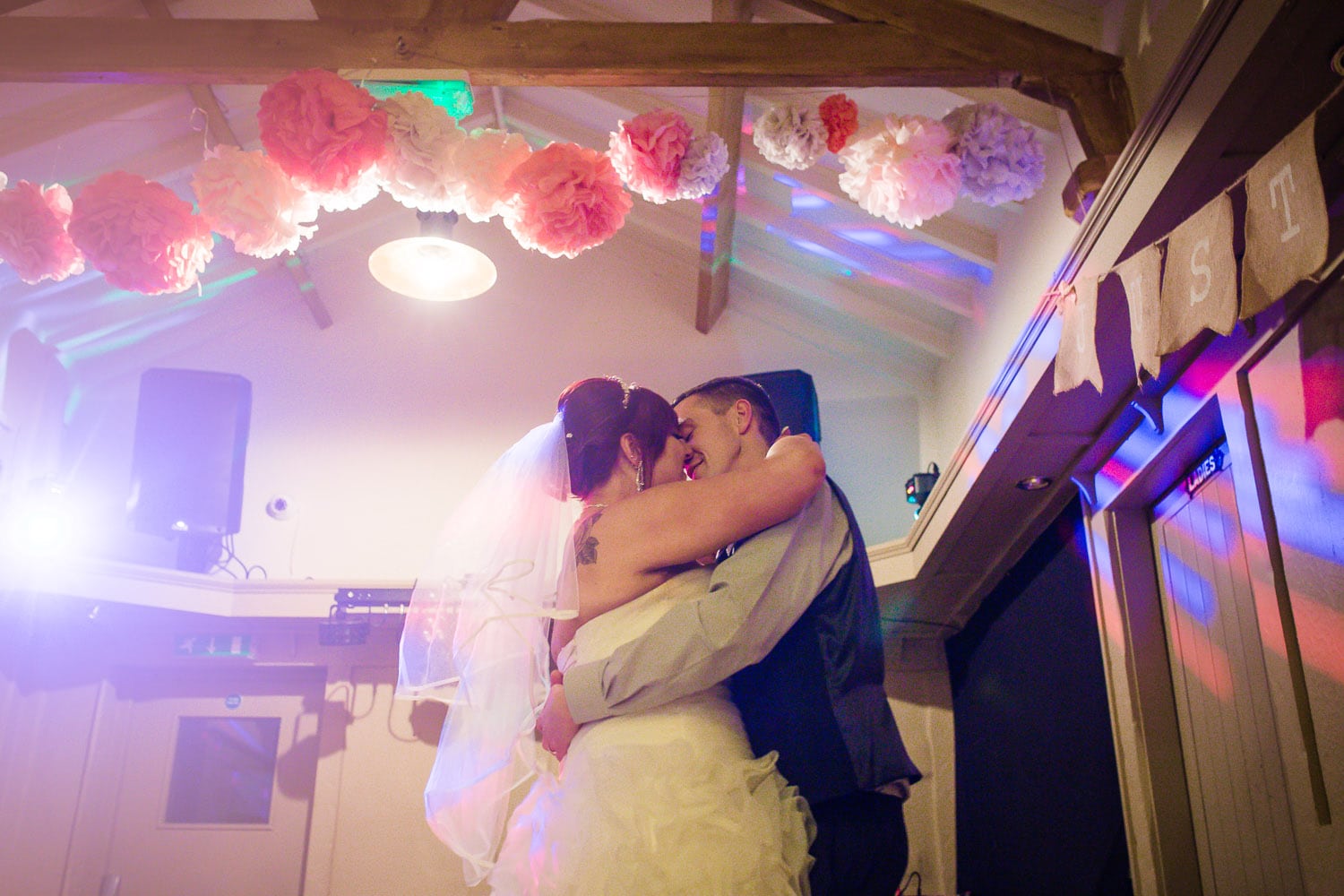 rugby bride and groom have a beautiful first dance