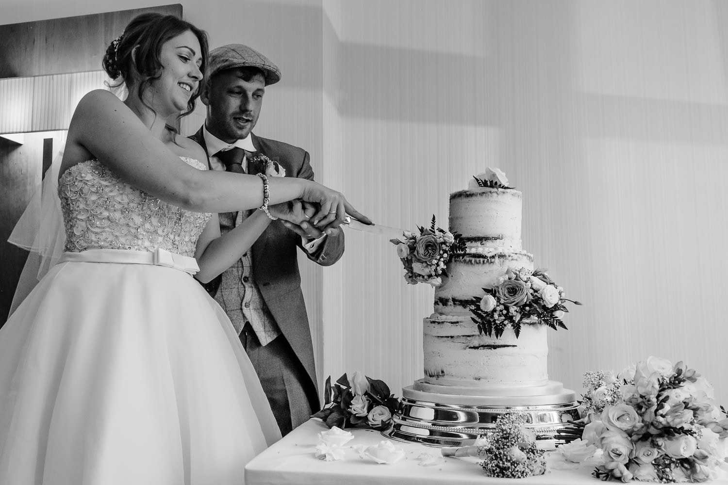 wedding day cake cutting at chesford grange hotel