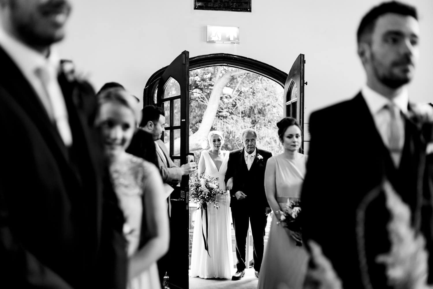 Father walking bride down the aisle at the pumping station in Cropston - Leicestershire