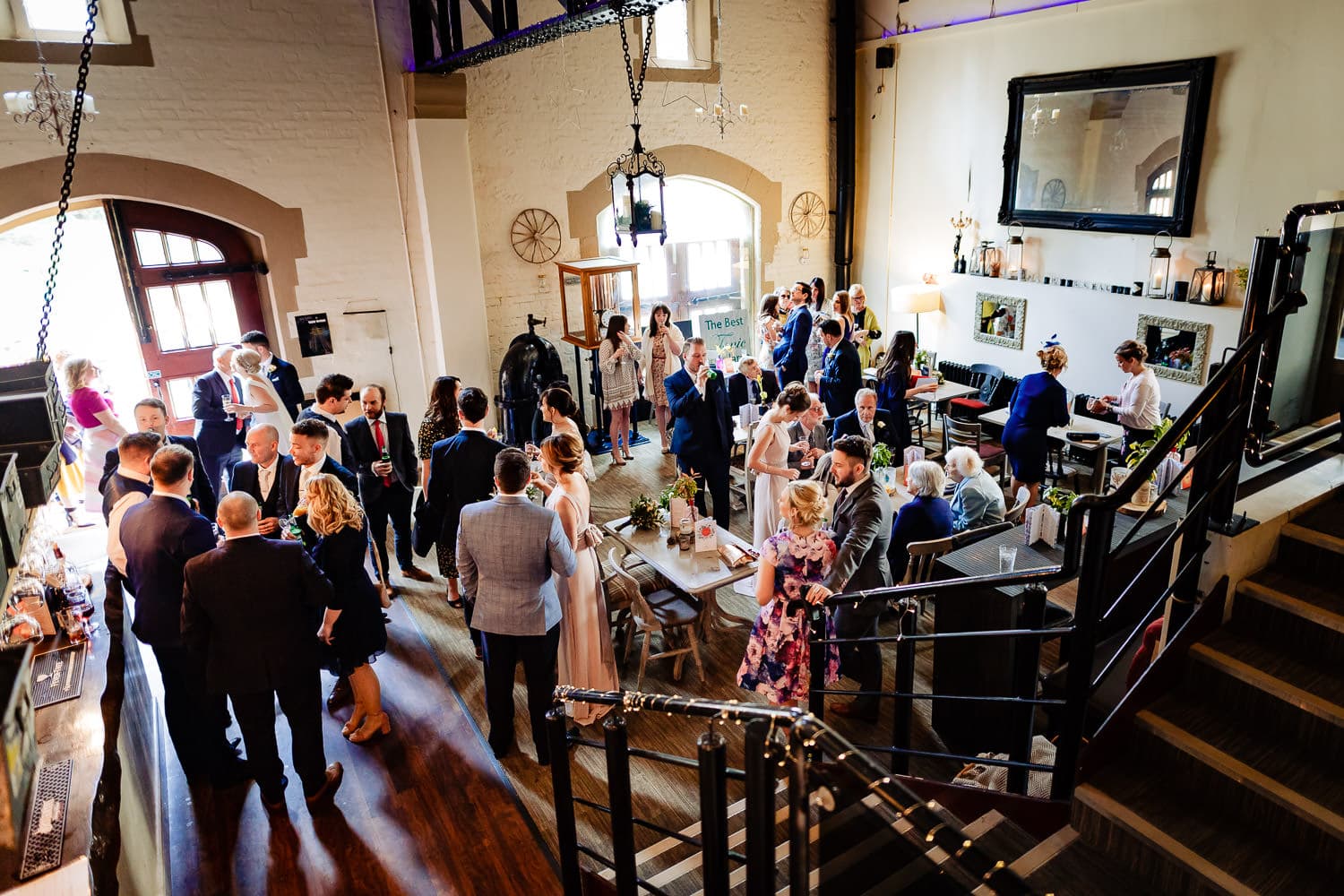 Wedding guests enjoying cocktails at The Pumping Station in Cropston - Leicestershire